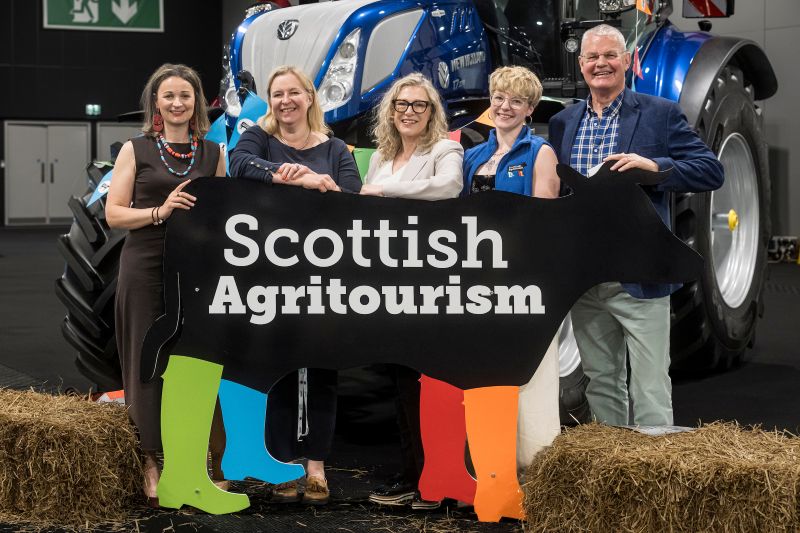 Global Agritourism Conference - Gillian Martin SAT Board Members Gillian Martin MSP and Scottish Agritourism board members posing with cow